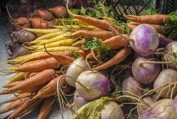 Yellow and orange carrots, beets, and sweet potatoes.