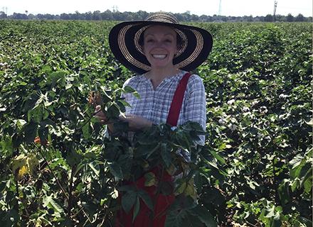 Michelle Heck in a cotton field.