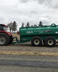 A tractor applying manure